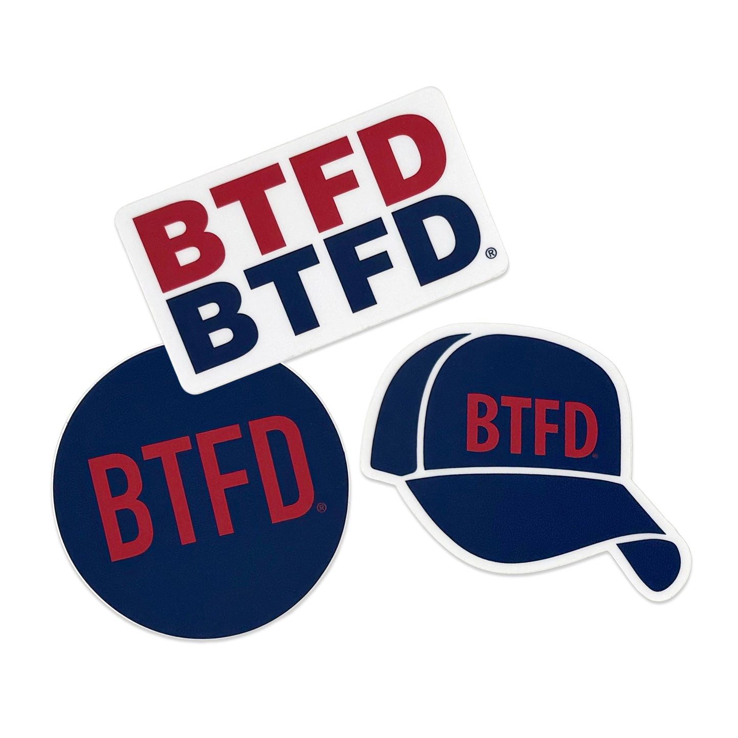 Three 'BTFD' branded stickers in different shapes and colors on a white background.