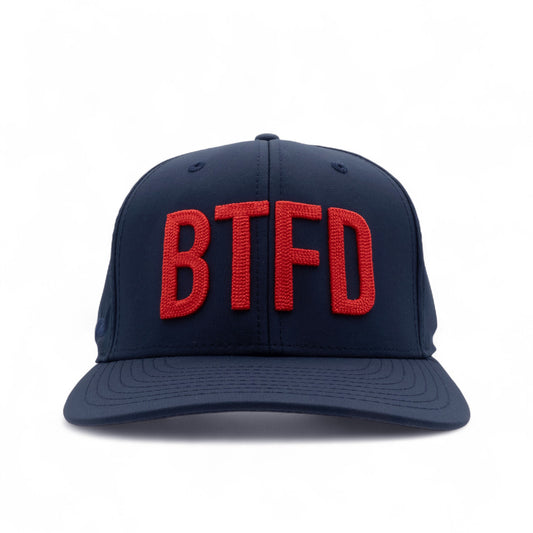 Navy blue cap with red 'BTFD' text on a white background