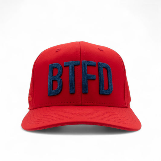 Red cap with 'BTFD' in blue on a white background
