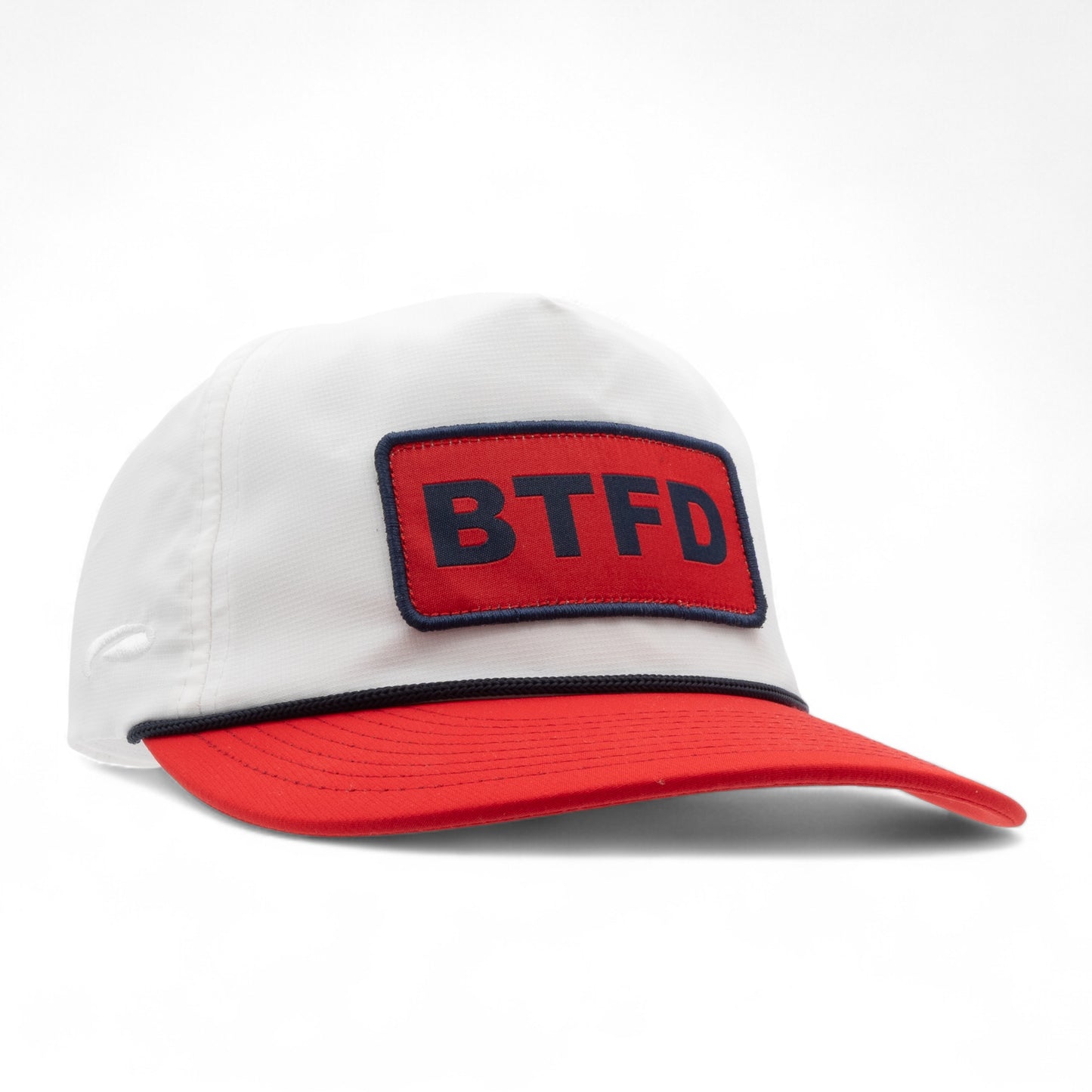 White cap with a red bill and 'BTFD' patch on a white background