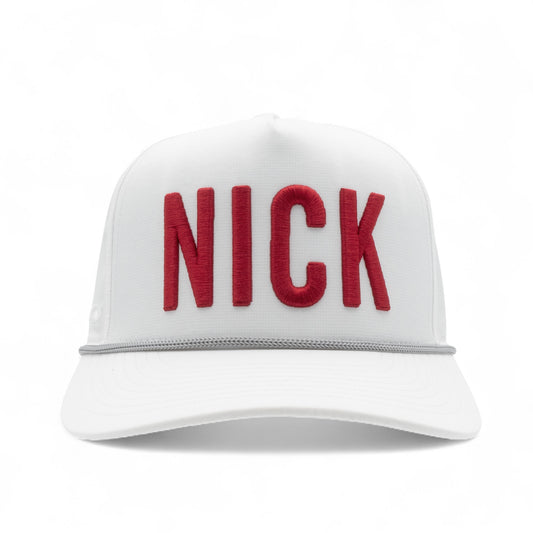 White cap with red 'NICK' text on a white background