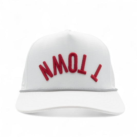 White cap with crimson 'T TOWN' text on a white background
