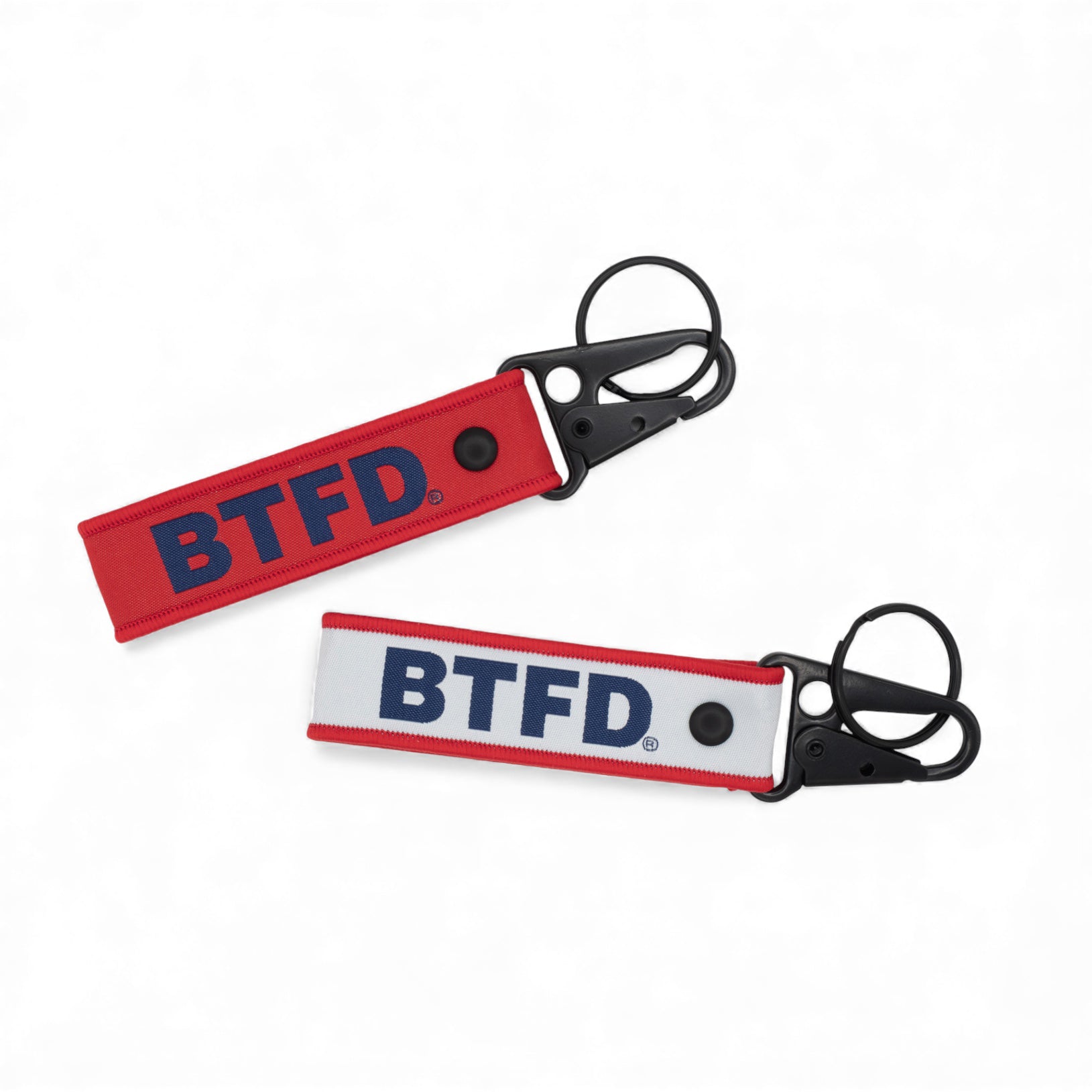 Two keychains with 'BTFD' branding on a white background