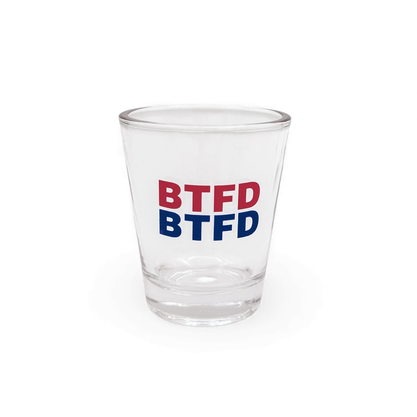 Clear shot glass with 'BTFD' text in red and blue on a white background