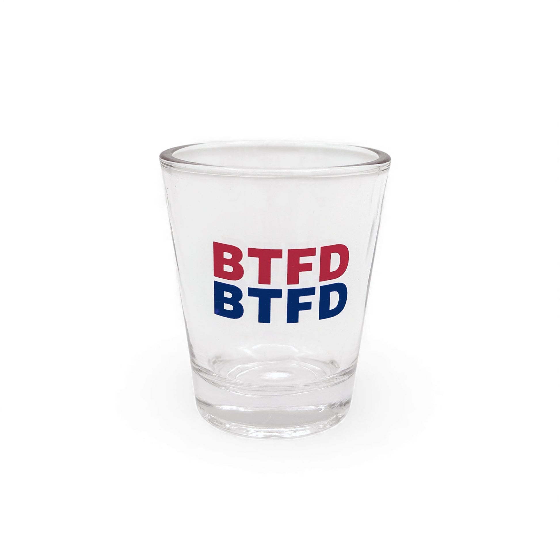 Clear shot glass with 'BTFD' text in red and blue on a white background