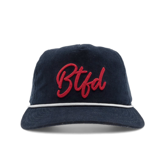 navy corduroy cap with Btfd in script and a white cord