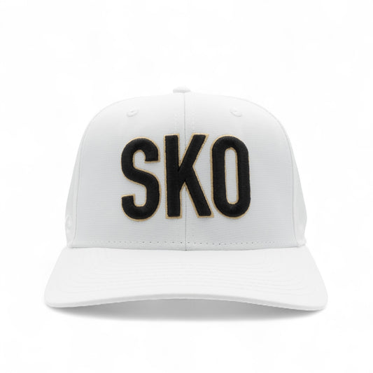 White cap with black  'SKO' text on a white background